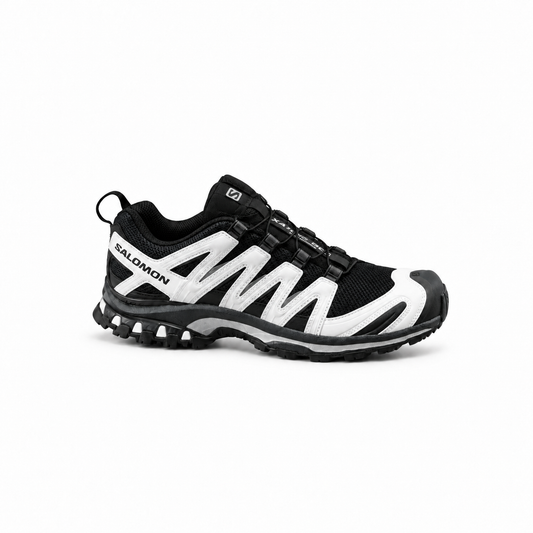 Salomon Quest GTX Neon White - black trail sneaker with white overlays, side view